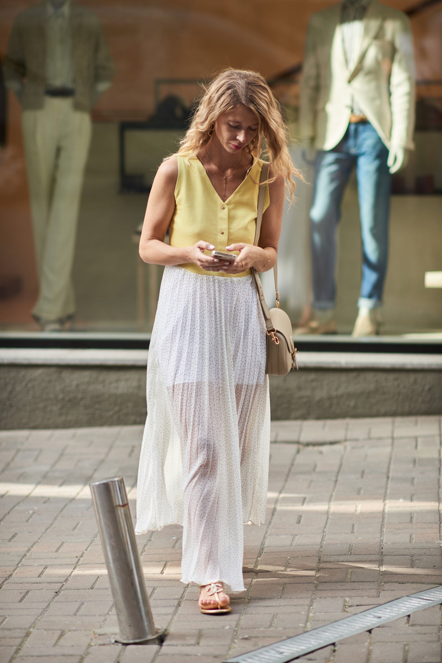 Combined dress with a pleated skirt in polka dot print