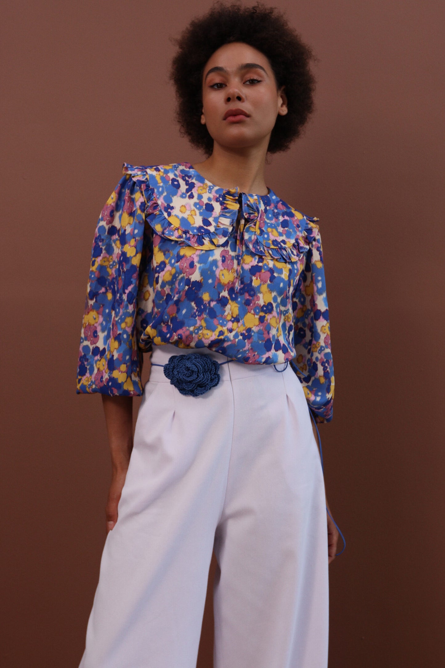 Silk Tie-Die Blouse with a Peter-Pan collar.
