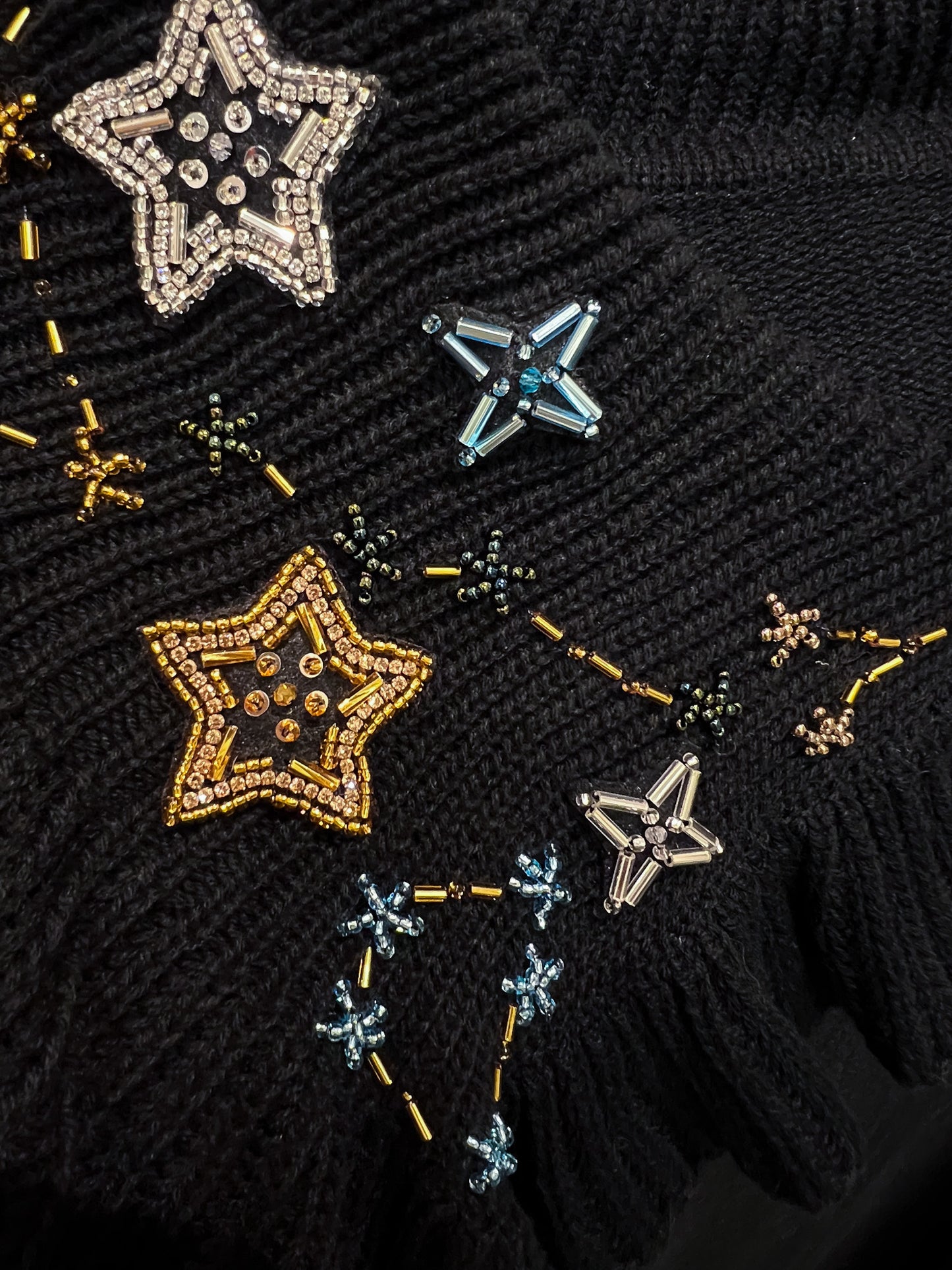 Exclusive black knitted dress-sweater with hand-made embroidery