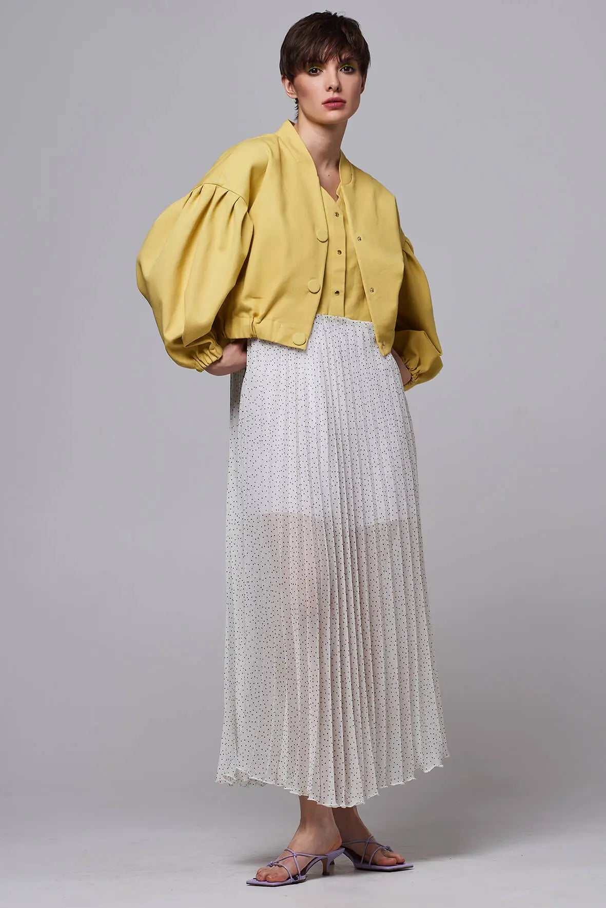 Combined dress with pleated polka dot skirt