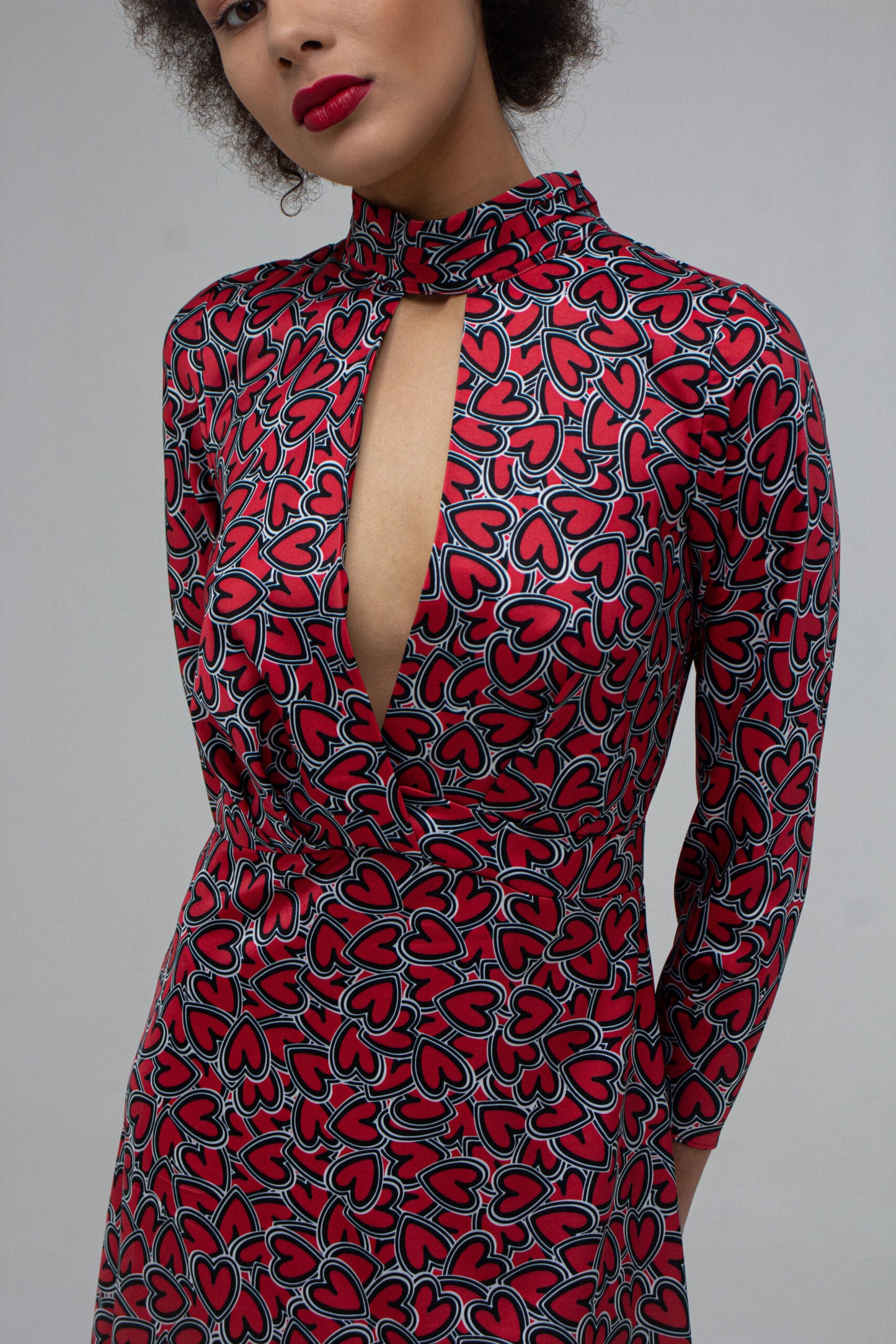 Dress with a cutout in front, author's print "heart", midi length