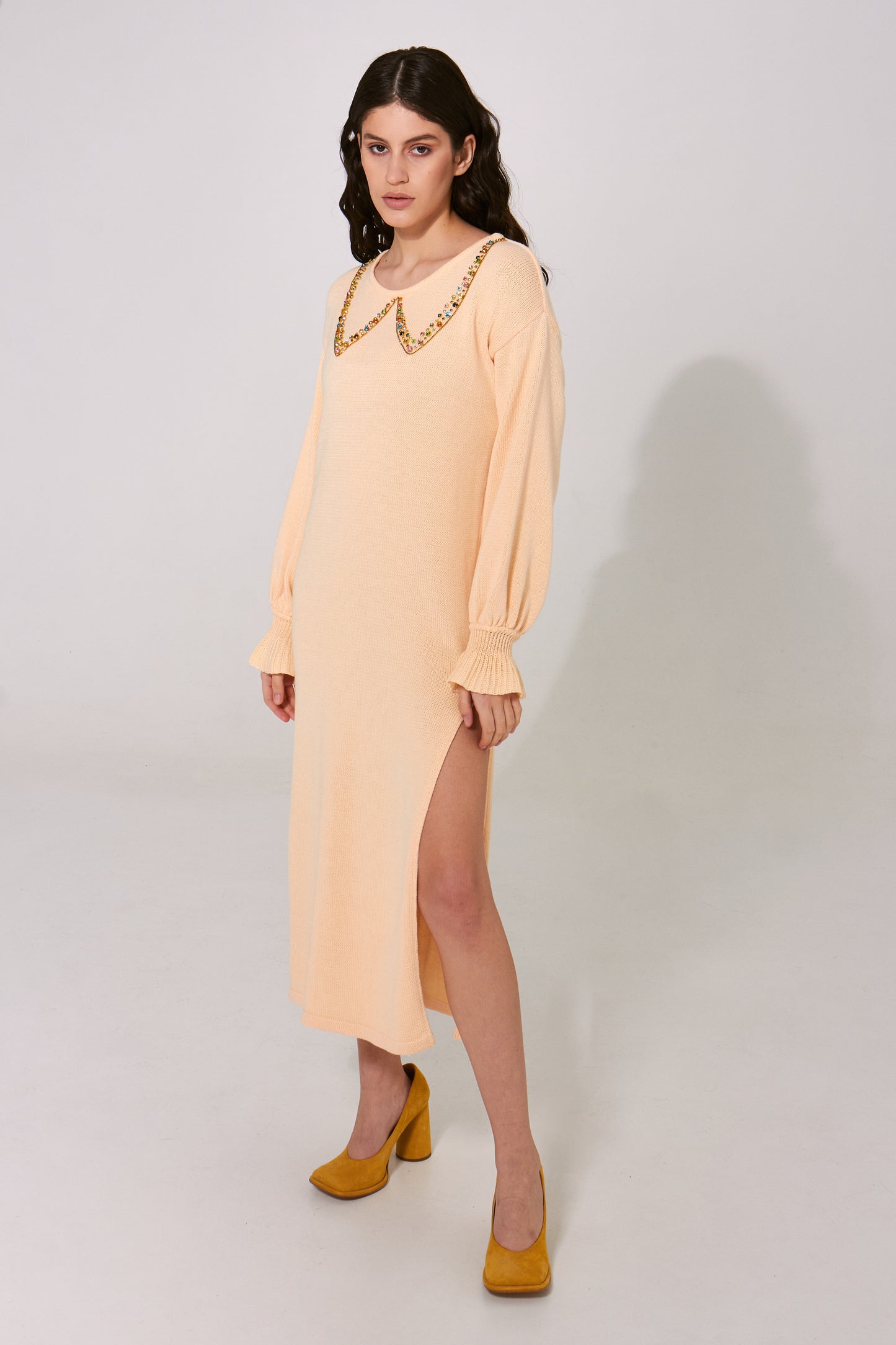 Light yellow knitted dress with hand-made embroidery