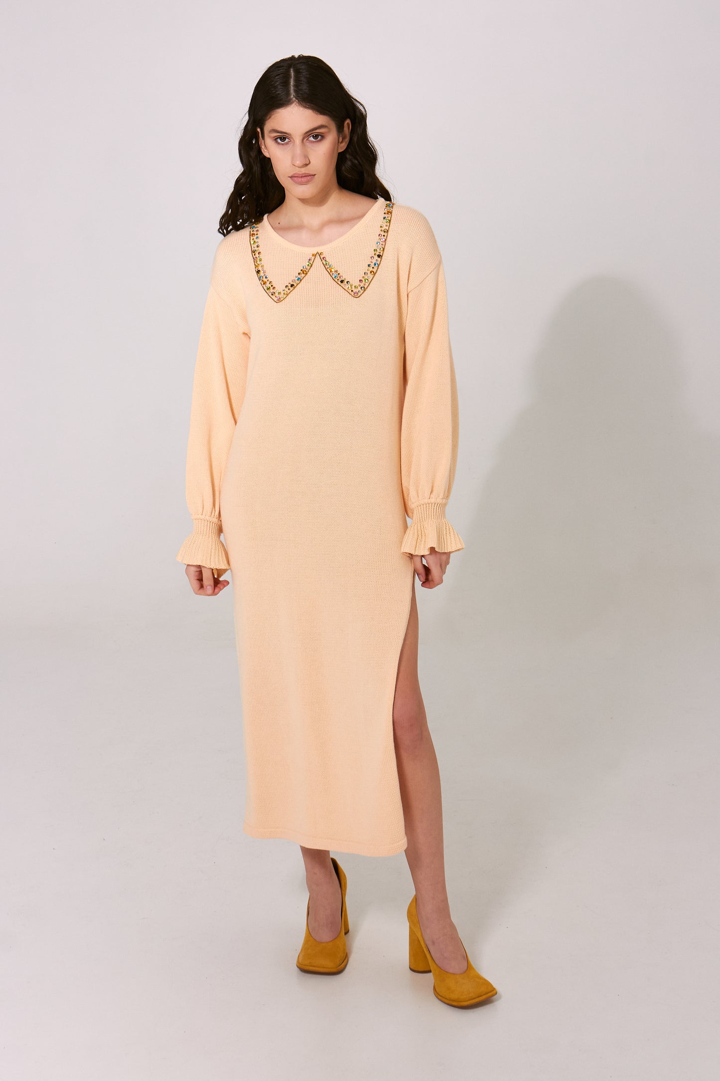 Light yellow knitted dress with hand-made embroidery