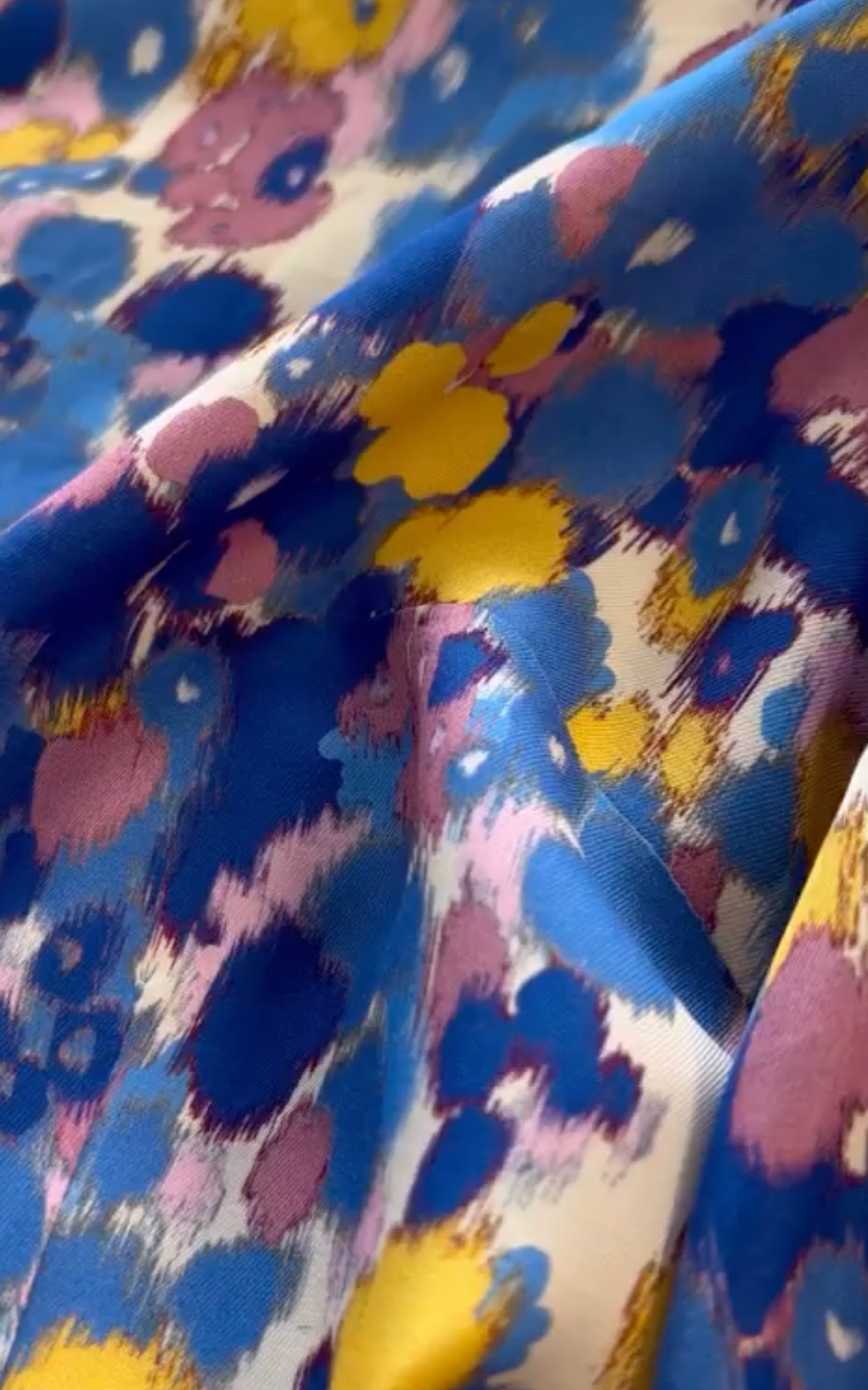 Silk Tie-Die Blouse with a Peter-Pan collar.