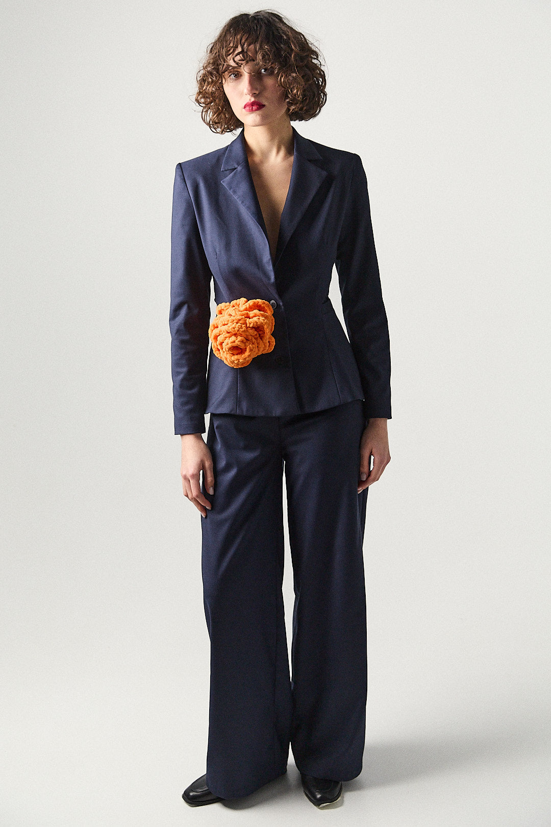 New Look navy blue suit with a hand-made flower