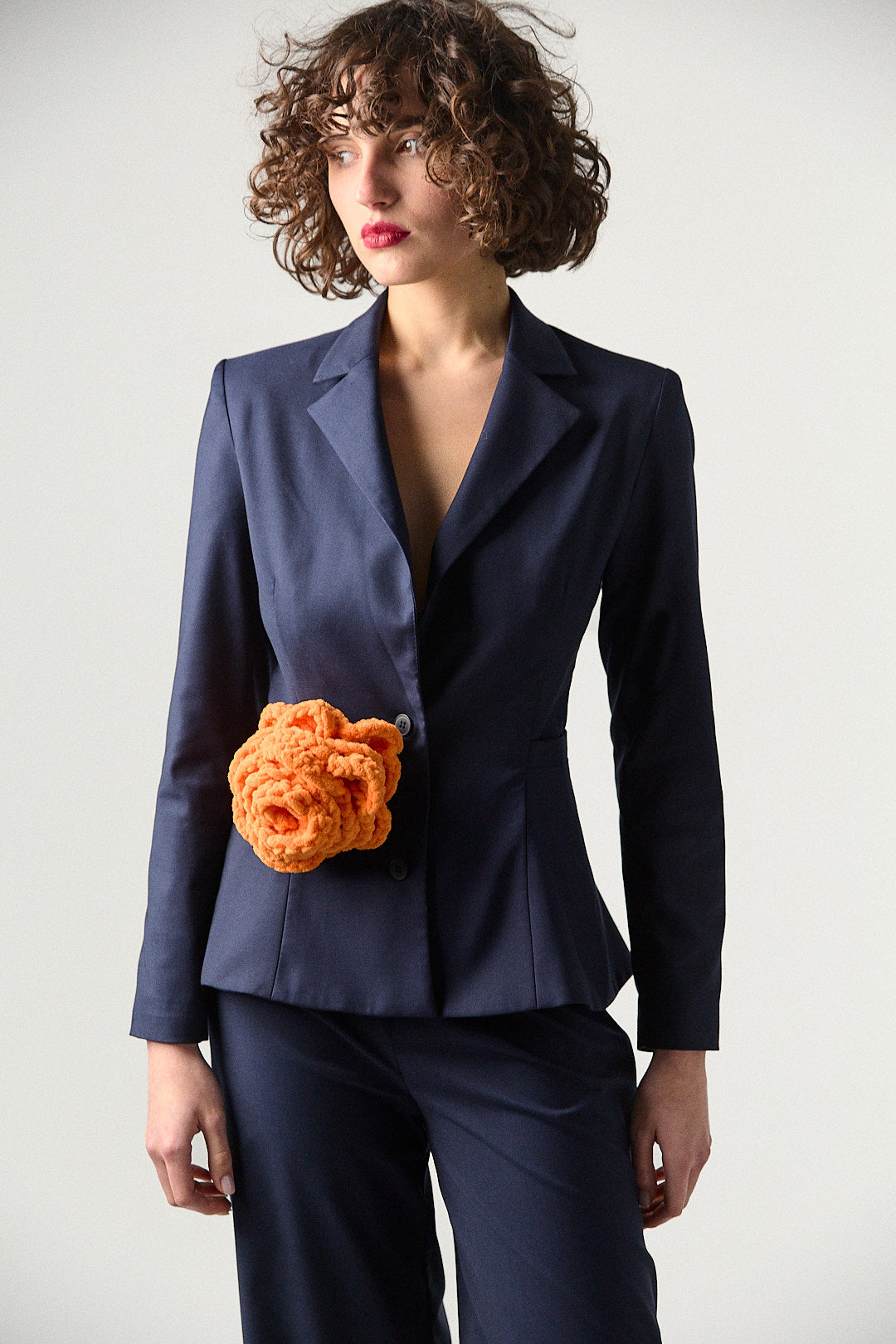 New Look navy blue suit with a hand-made flower