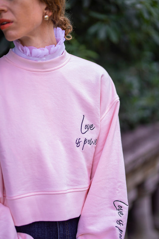 Gentle pink sweater with embroidery “LOVE IS POWER”