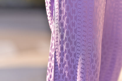 Pantalones de jacquard violeta con motivo de cadenas