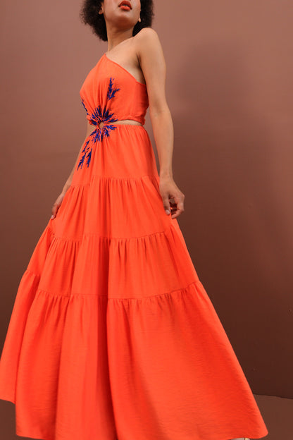 Orange dress with hand-made embroidery.