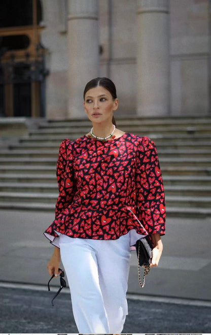 Blouse with puff sleeves and a basque
