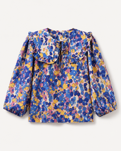 Silk Tie-Die Blouse with a Peter-Pan collar.